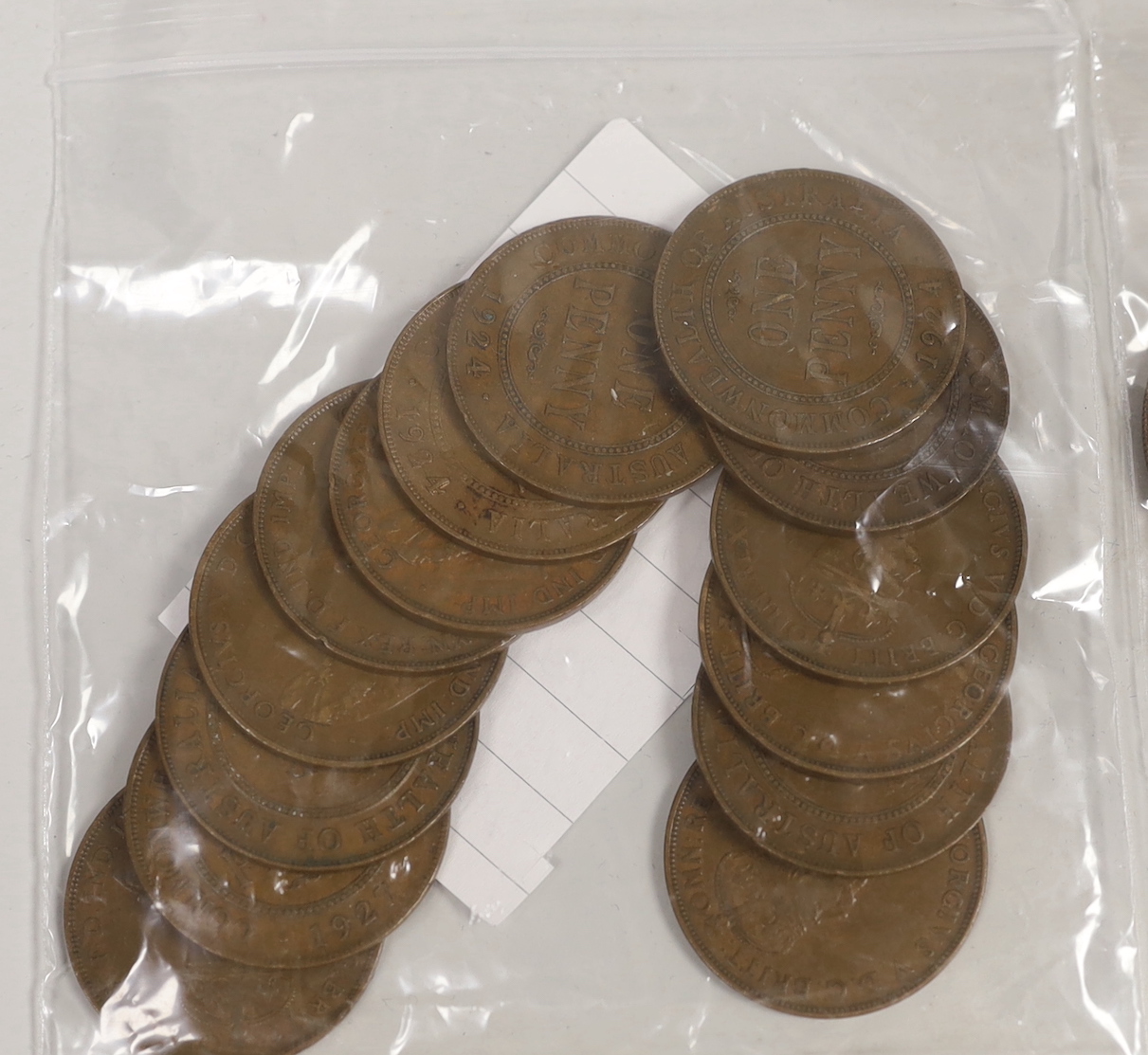 Australia and World coins to include Australia 1927 florin, one penny 1917, 1920, 1921, 1922, 1924, 1927, 1934, a Peru 1 sol 1924, etc.